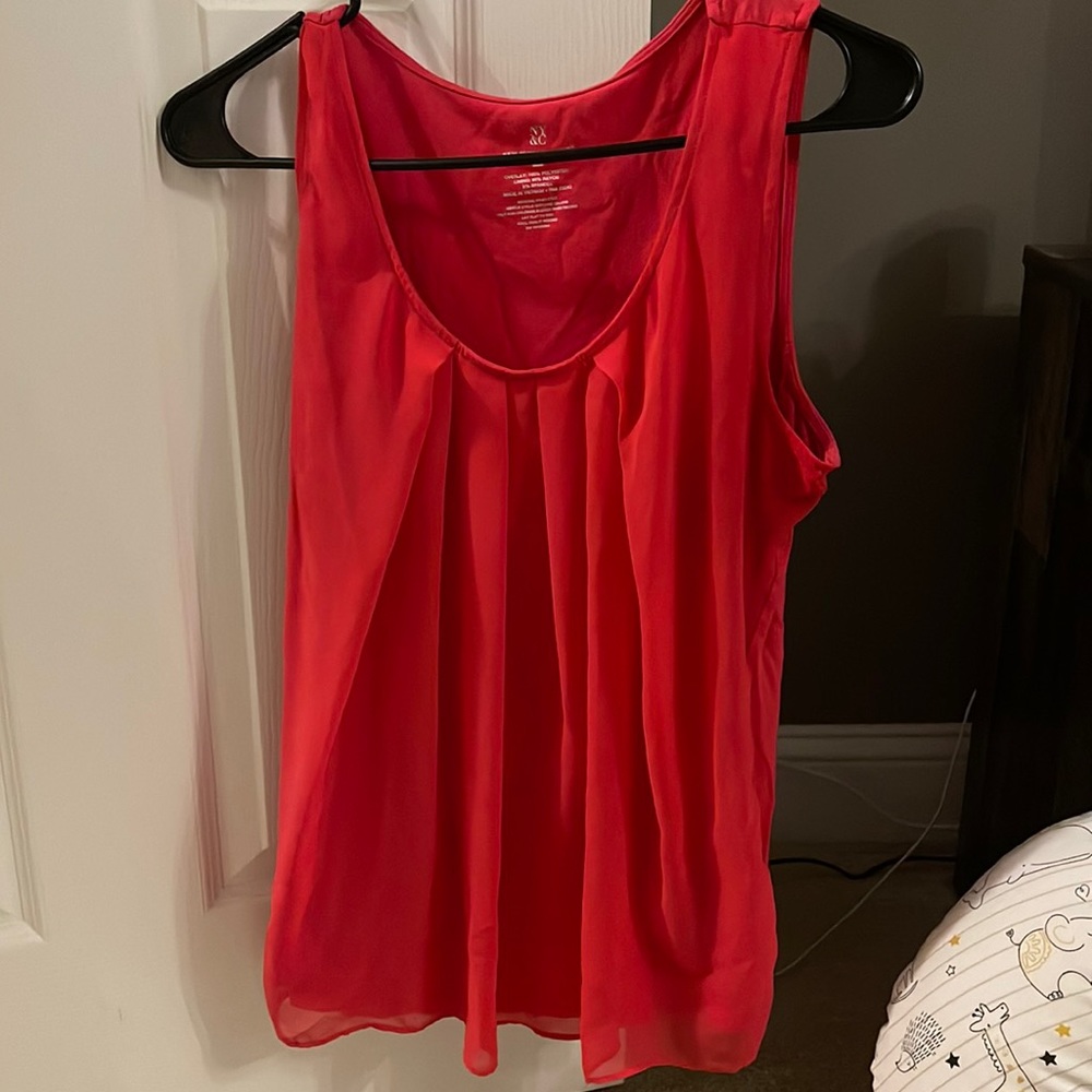 Red sleeveless top